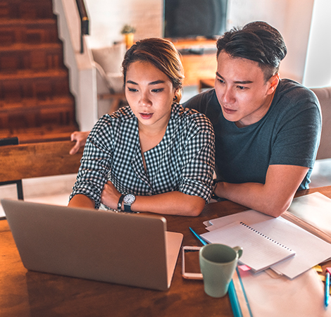 young couple working on a computer