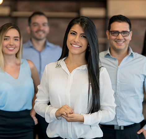 bank workers looking at the camera