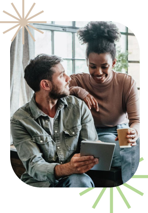 couple reading ipad