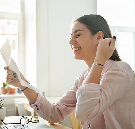 woman enjoying paperwork