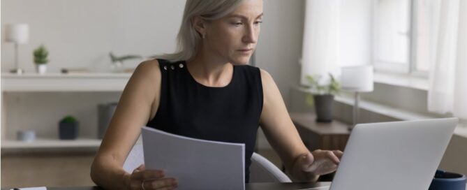 A woman goes over her checking account fees.